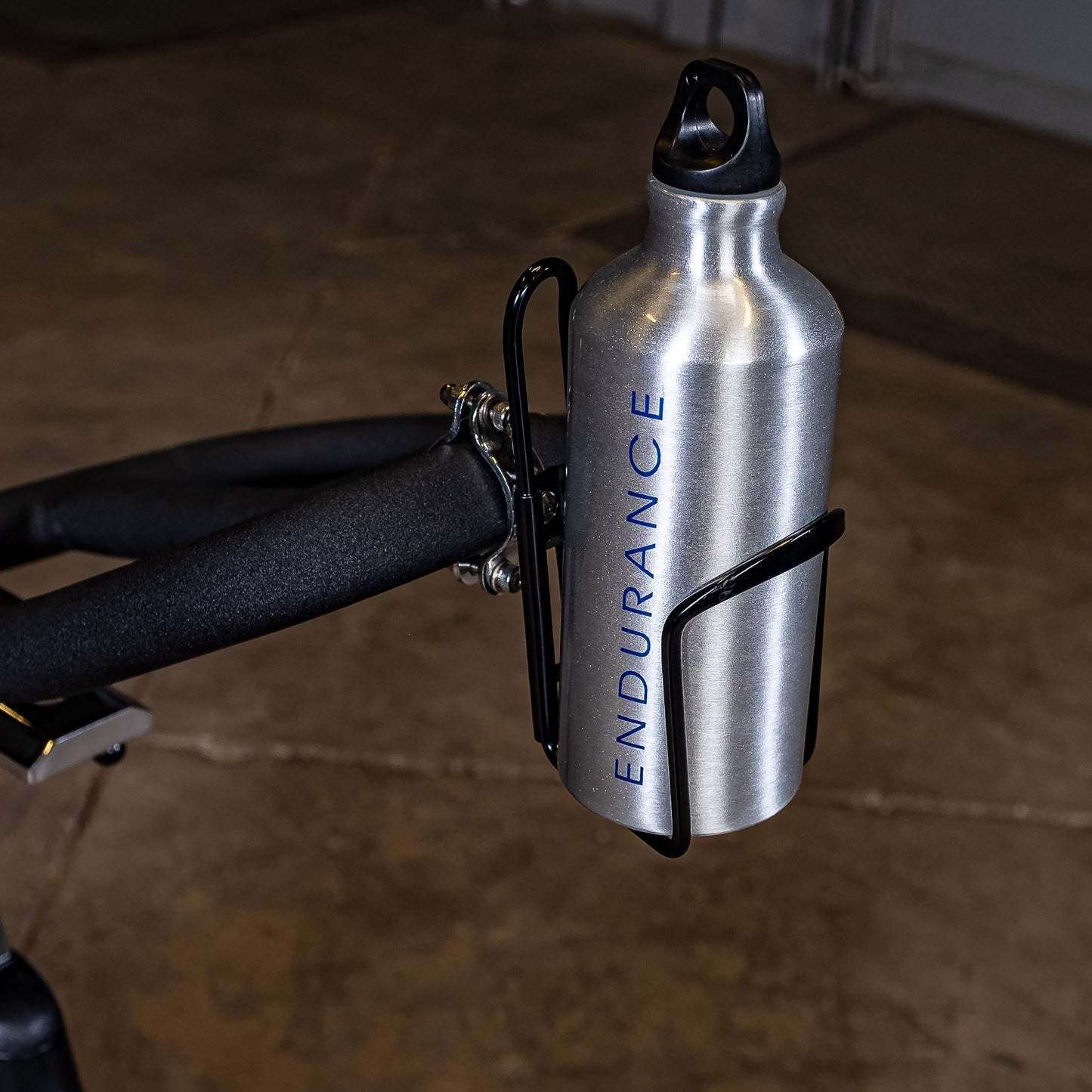 Close-up of the water bottle holder on Body-Solid Endurance ESB250 spin bike