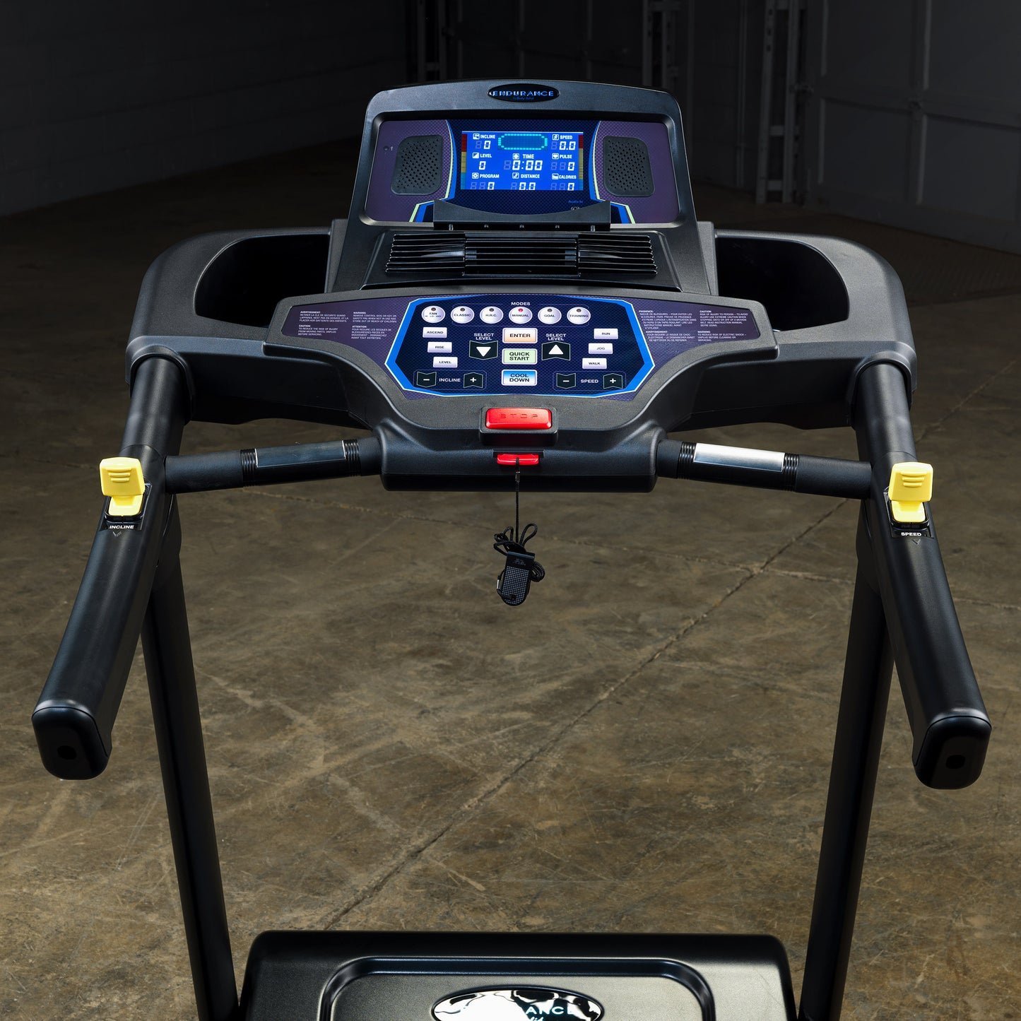Close-up of LED display and control console on Body-Solid Endurance T150 with speed, distance, and incline settings