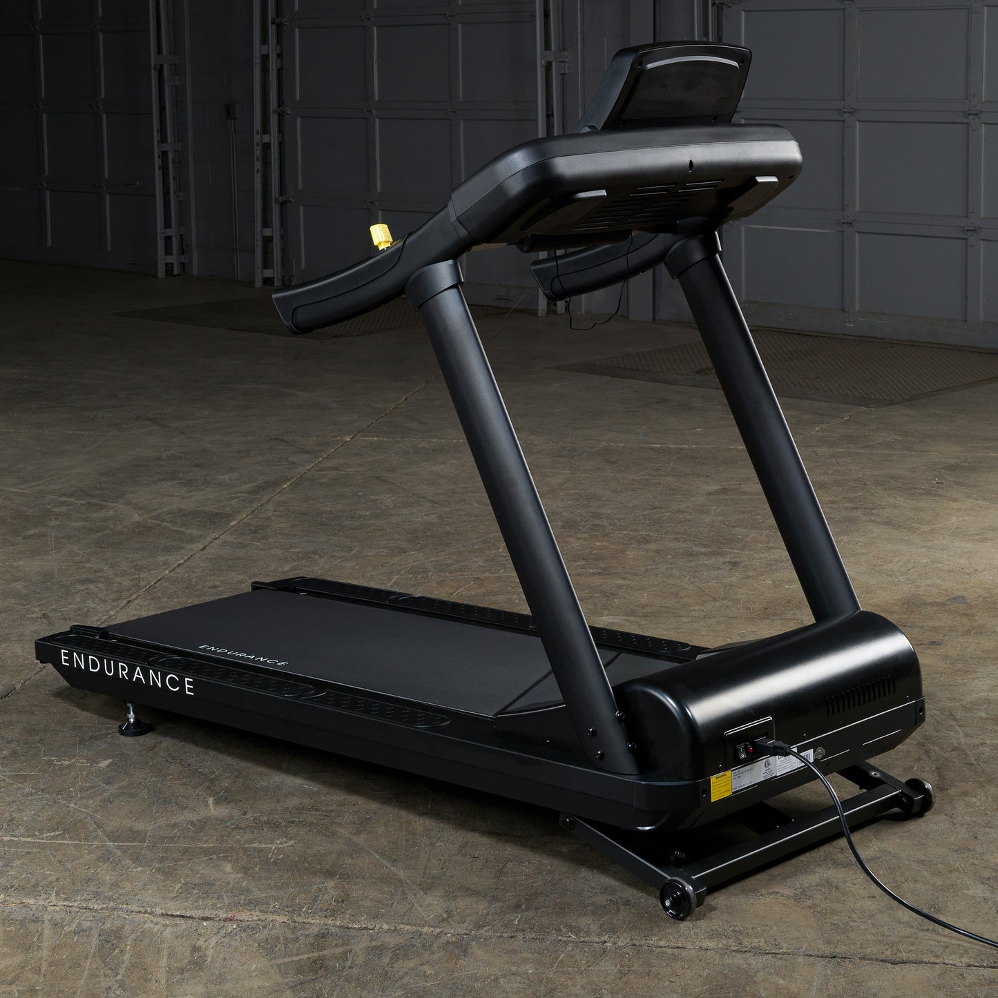 Side profile of Body-Solid T150 treadmill showing incline angle and running deck