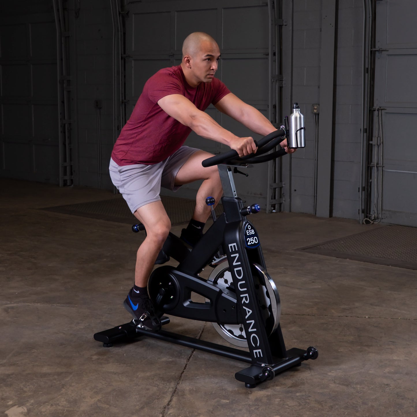 Man spinning on the Endurance by Body-Solid ESB250 Spin Bike