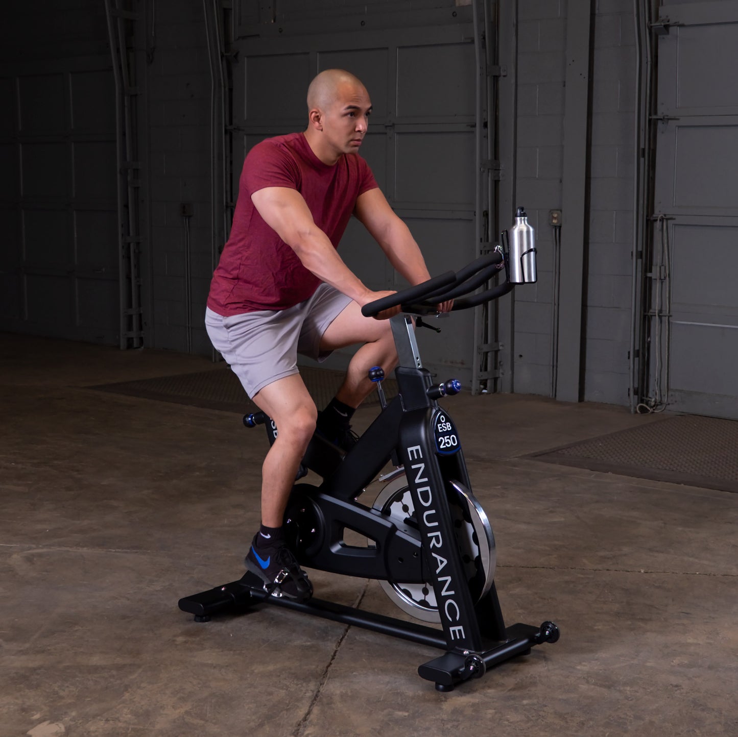 Man spinning on the Endurance by Body-Solid ESB250 Spin Bike