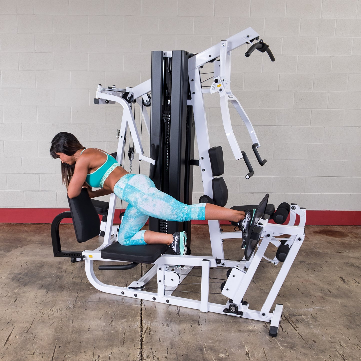 Body-Solid EXM3000LPS leg press station for lower body strength workouts.