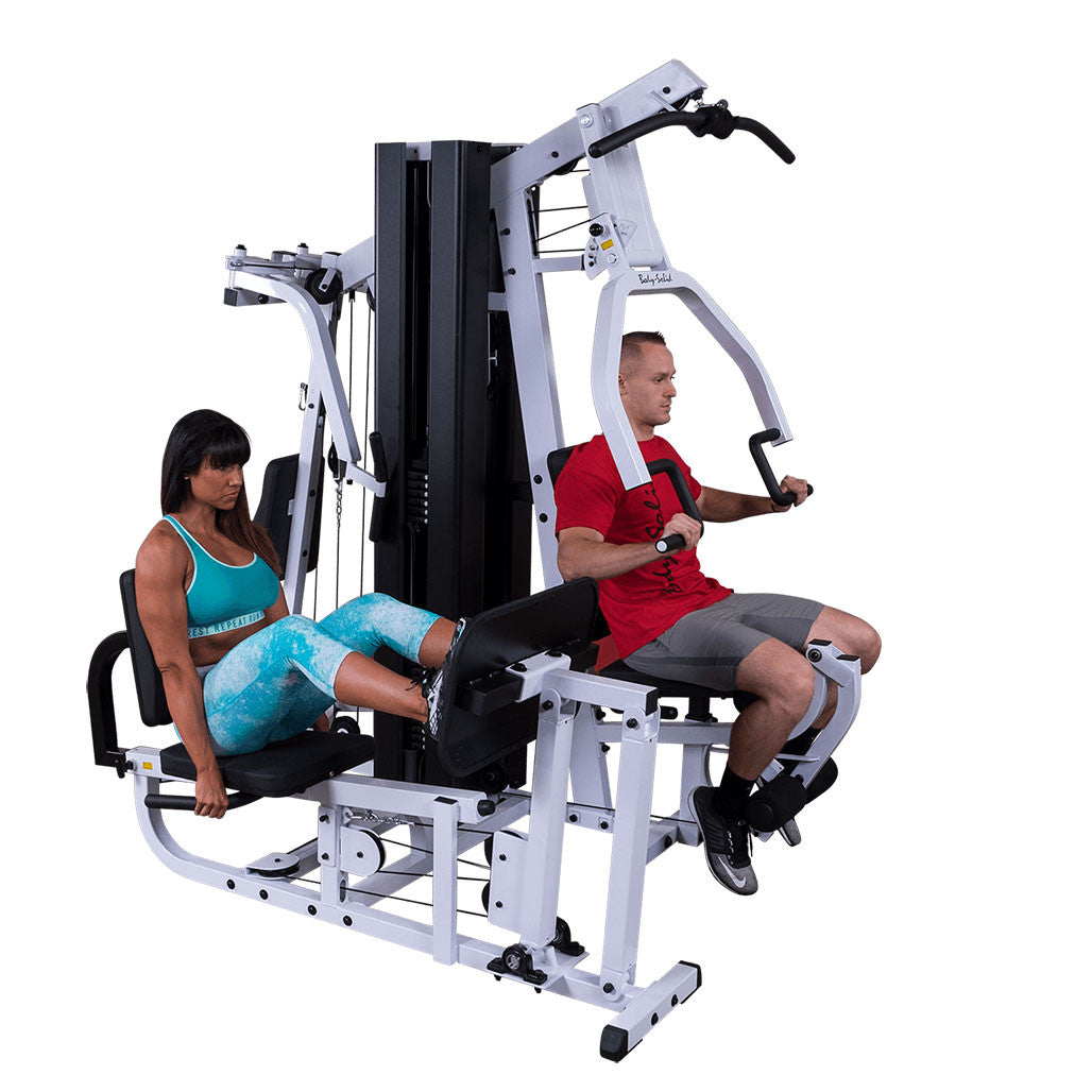 Body-Solid EXM3000LPS multi-stack home gym front view showing dual weight stations.