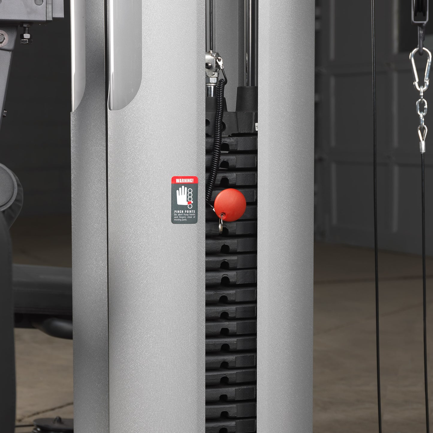 Close-up of the dual 210 lb weight stacks with selectorized plates on G9S