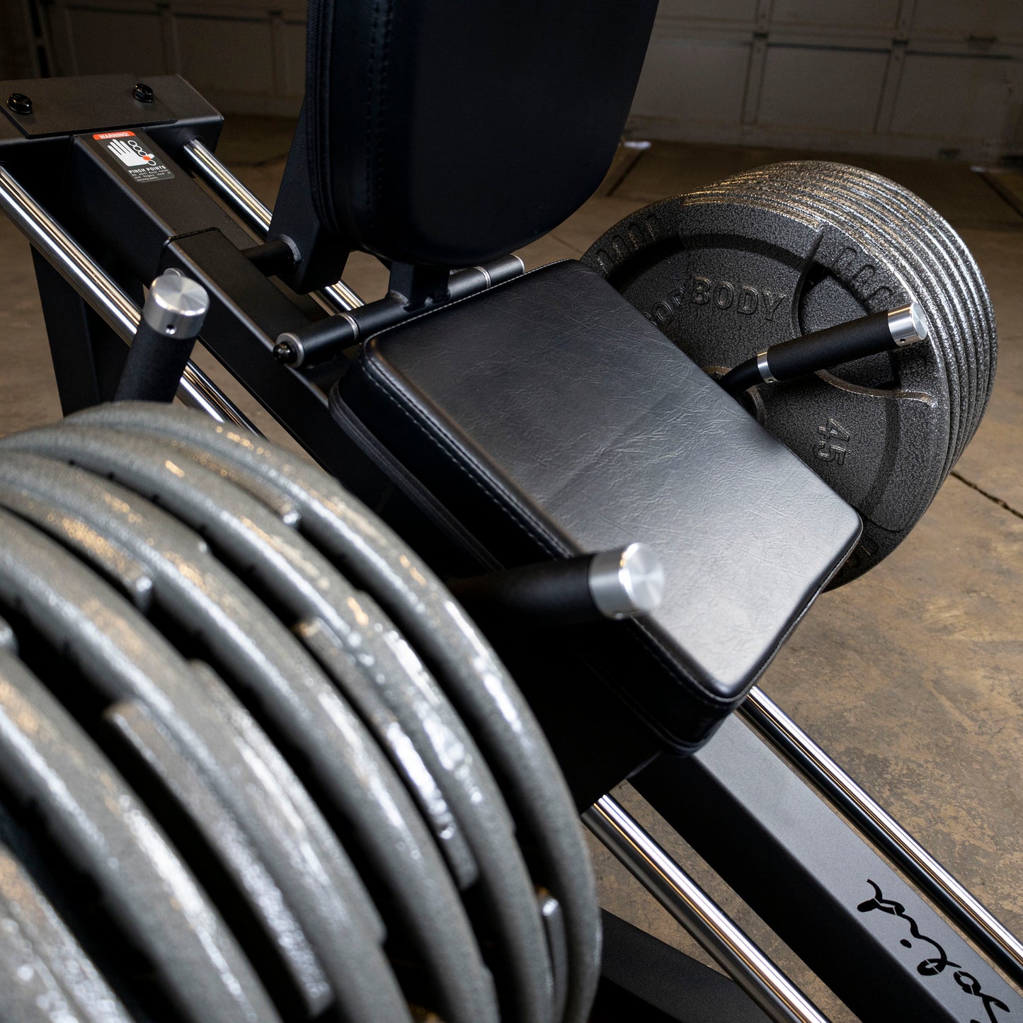 Body-Solid GCLP100 loaded with weight plates