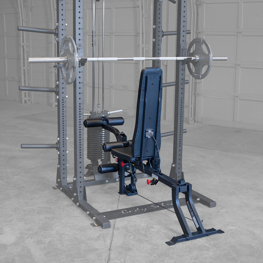 Body-Solid GLEG bench used inside a power rack for barbell overhead press