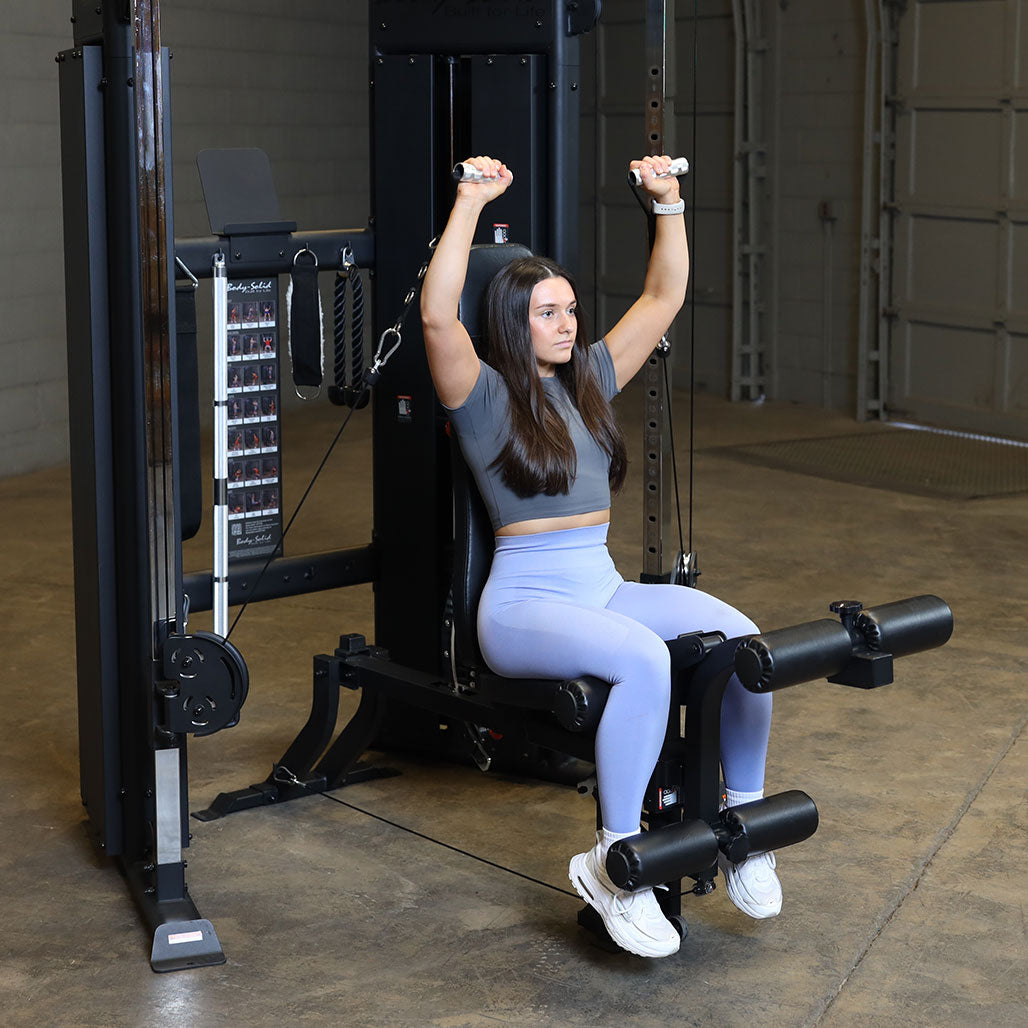 Body-Solid FID bench used inside a power rack for cable overhead press