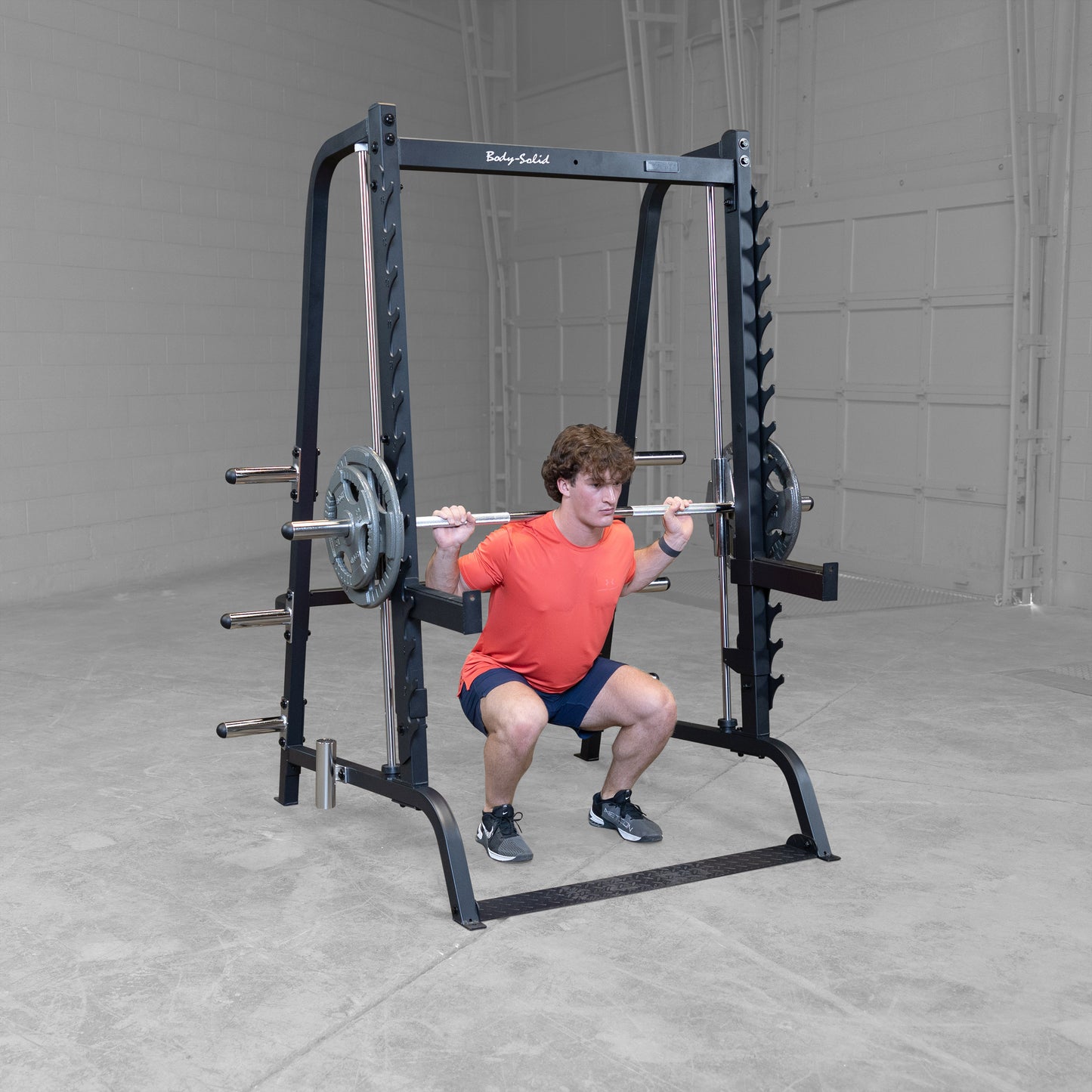 Linear bearing steel bar glide on the Body-Solid GS348B Series 7 Smith Machine