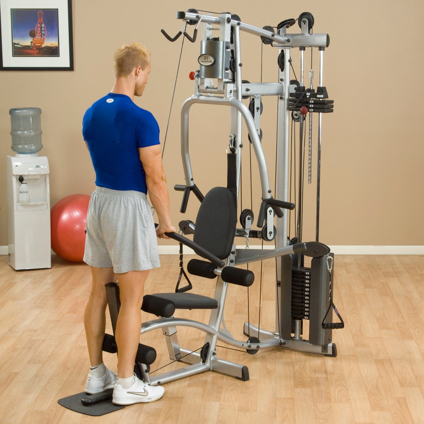 Back view of Body-Solid Powerline P2X Home Gym with lat pulldown station