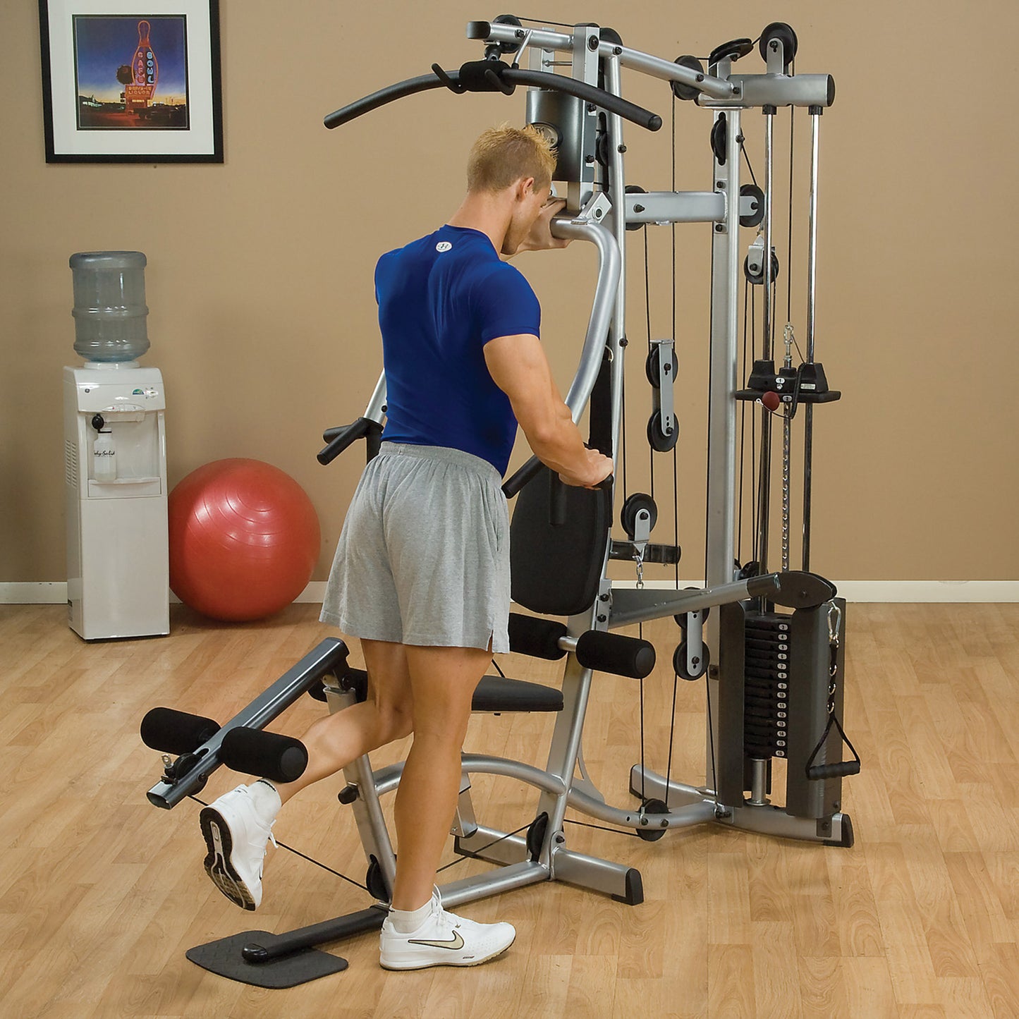 Body-Solid Powerline P2X Home Gym leg curl workout