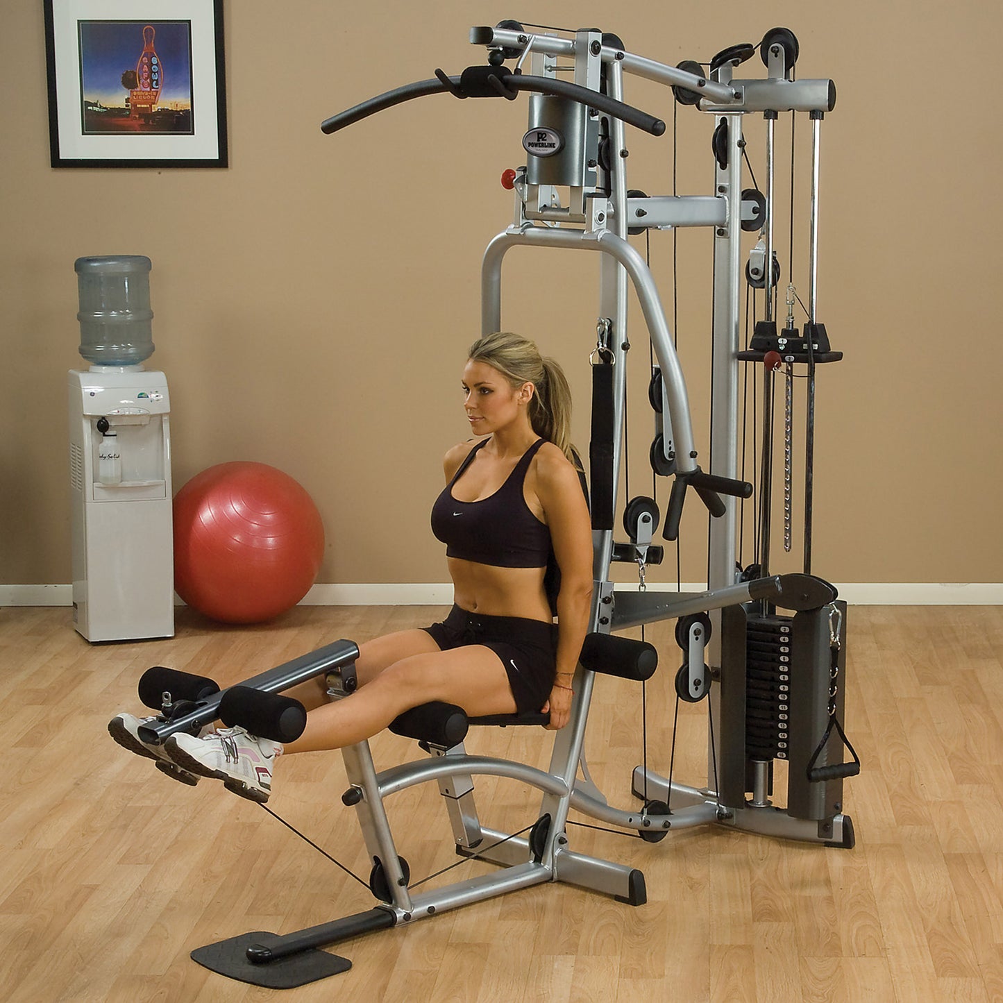 Body-Solid P2X Home Gym leg extension in use