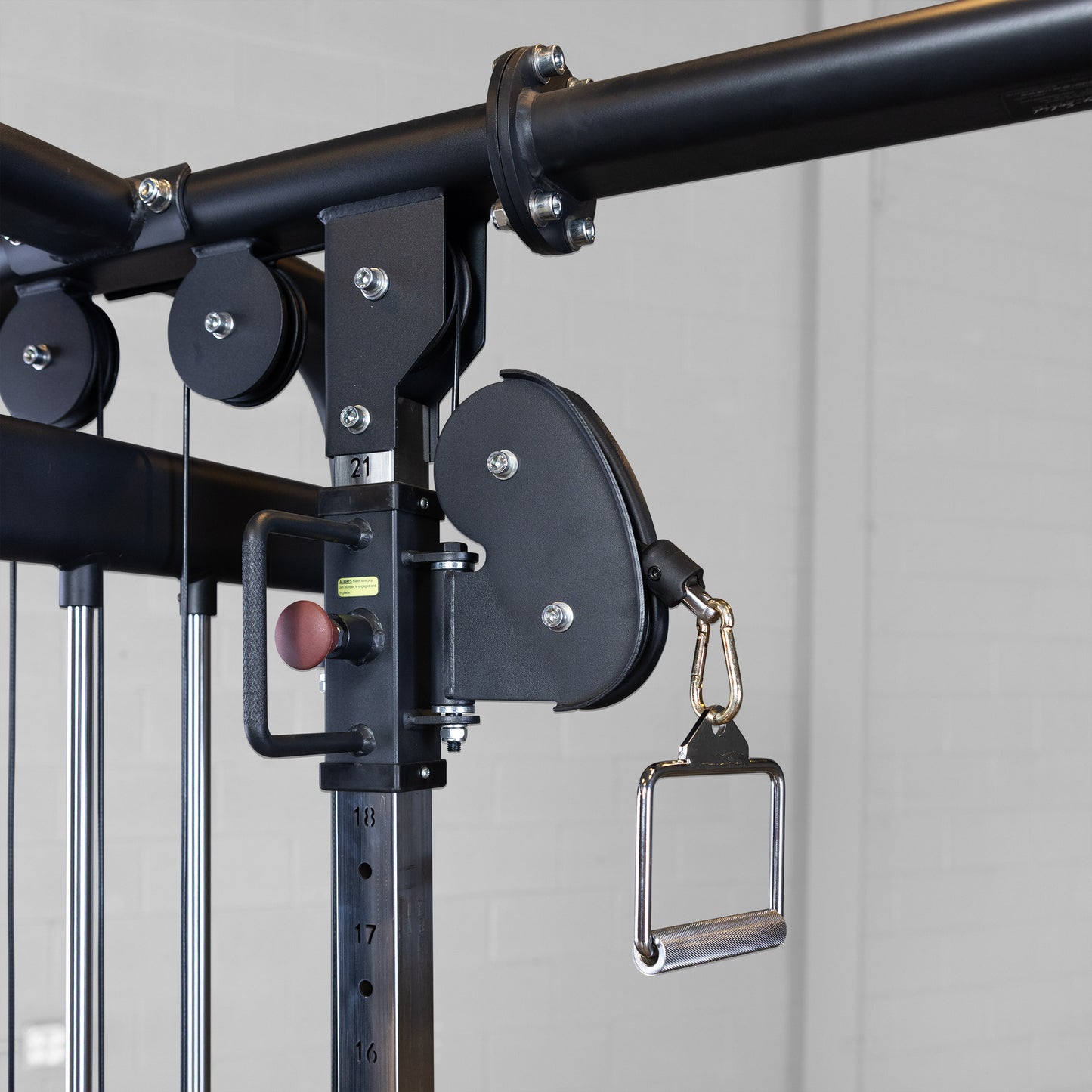 Dual adjustable cable column station on the Body-Solid SJG100 for crossover and functional training