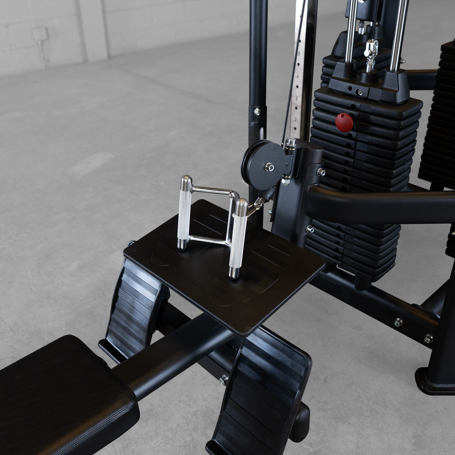 Low row cable workout station on Body-Solid SJG100 jungle gym