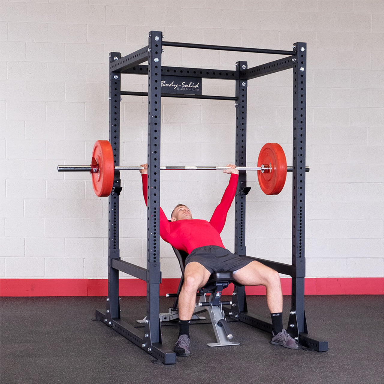 Body-Solid SPR1000 rack being used for bench press