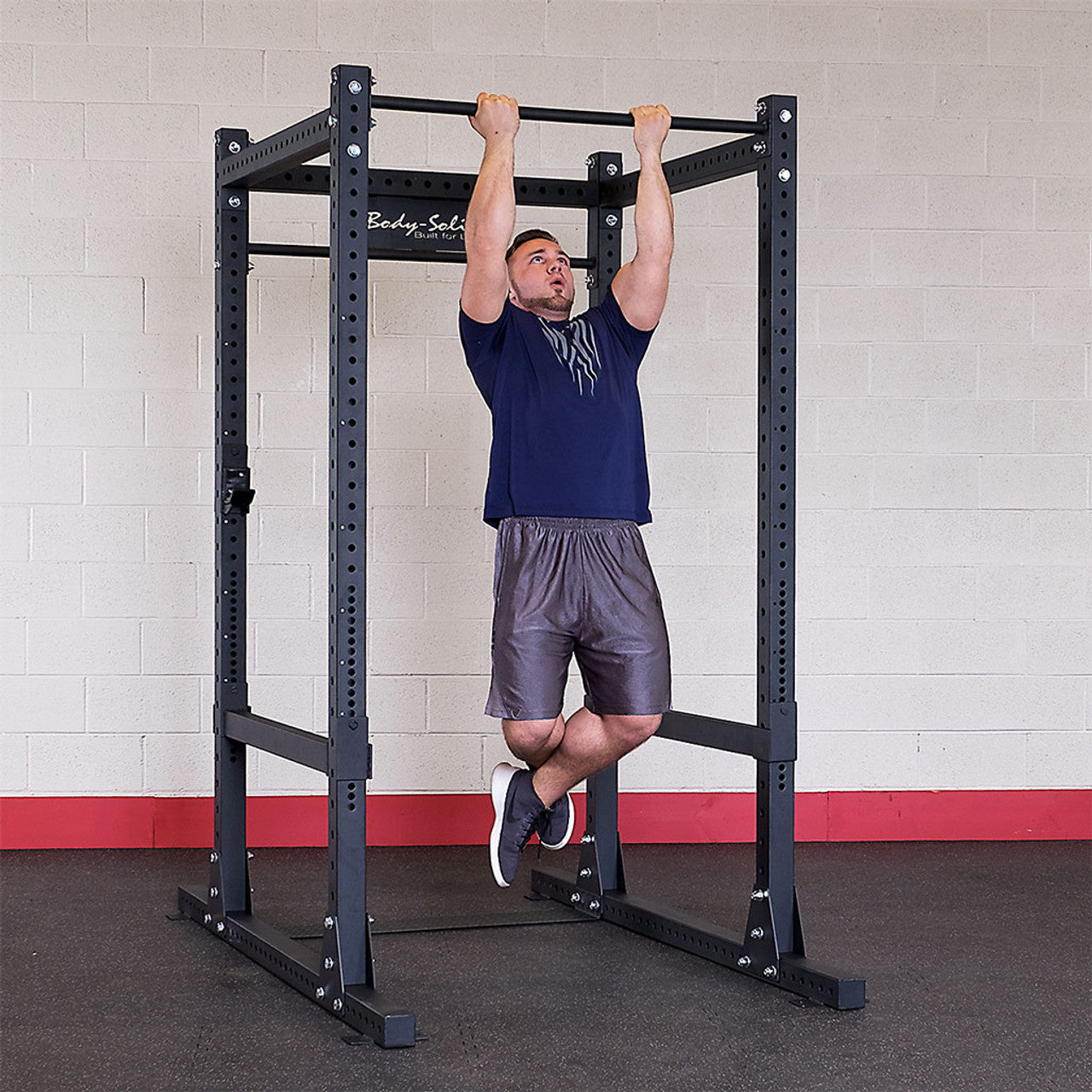 Pull-up bar being used on the Body-Solid SPR1000 Power Rack