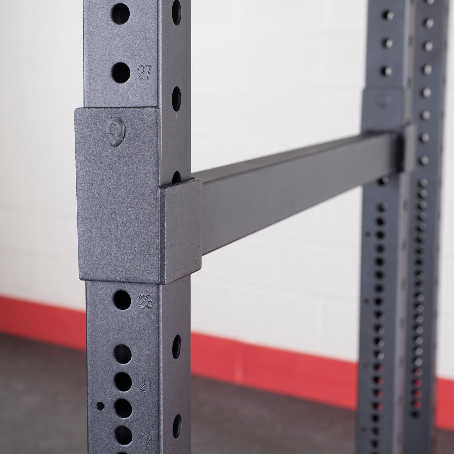 Close-up of textured powder-coated steel finish on rack frame