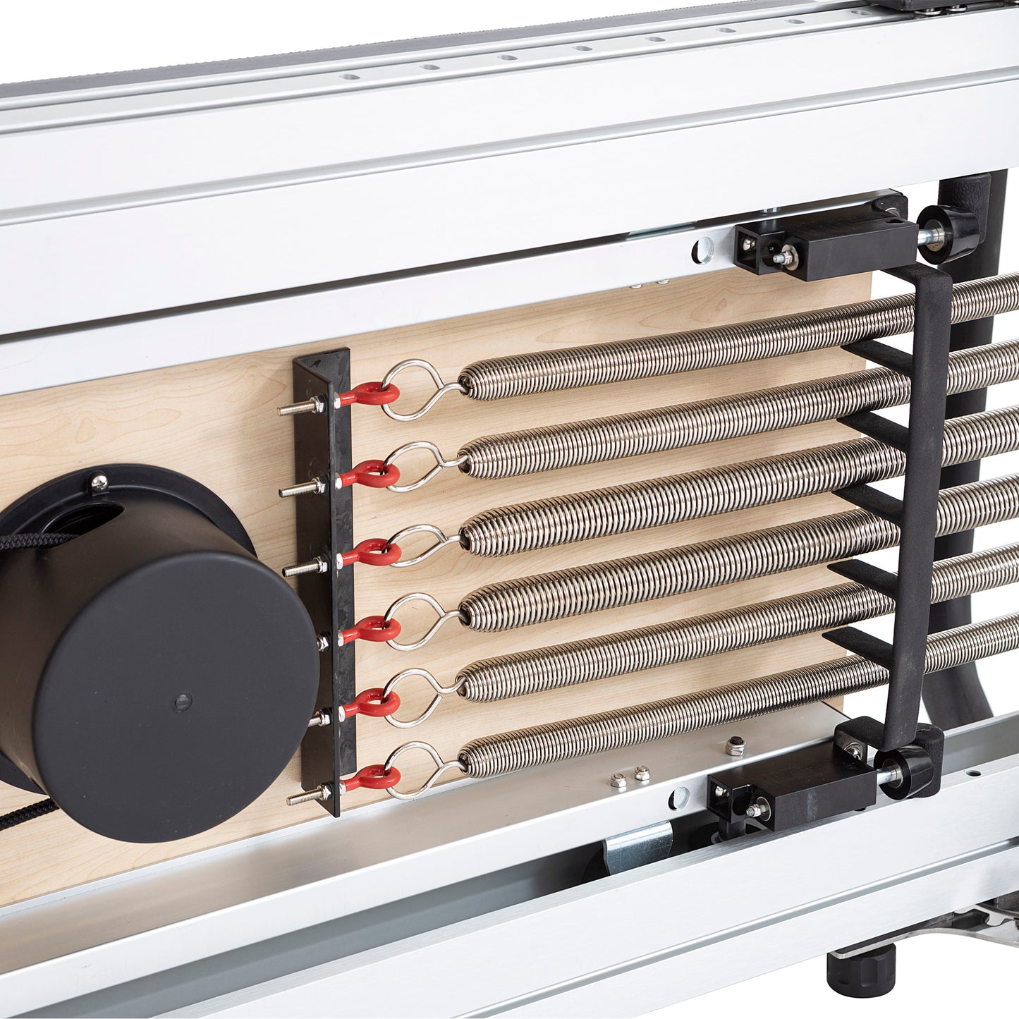 Color-coded springs attached to the Elina Pilates Mentor Reformer, demonstrating adjustable resistance options