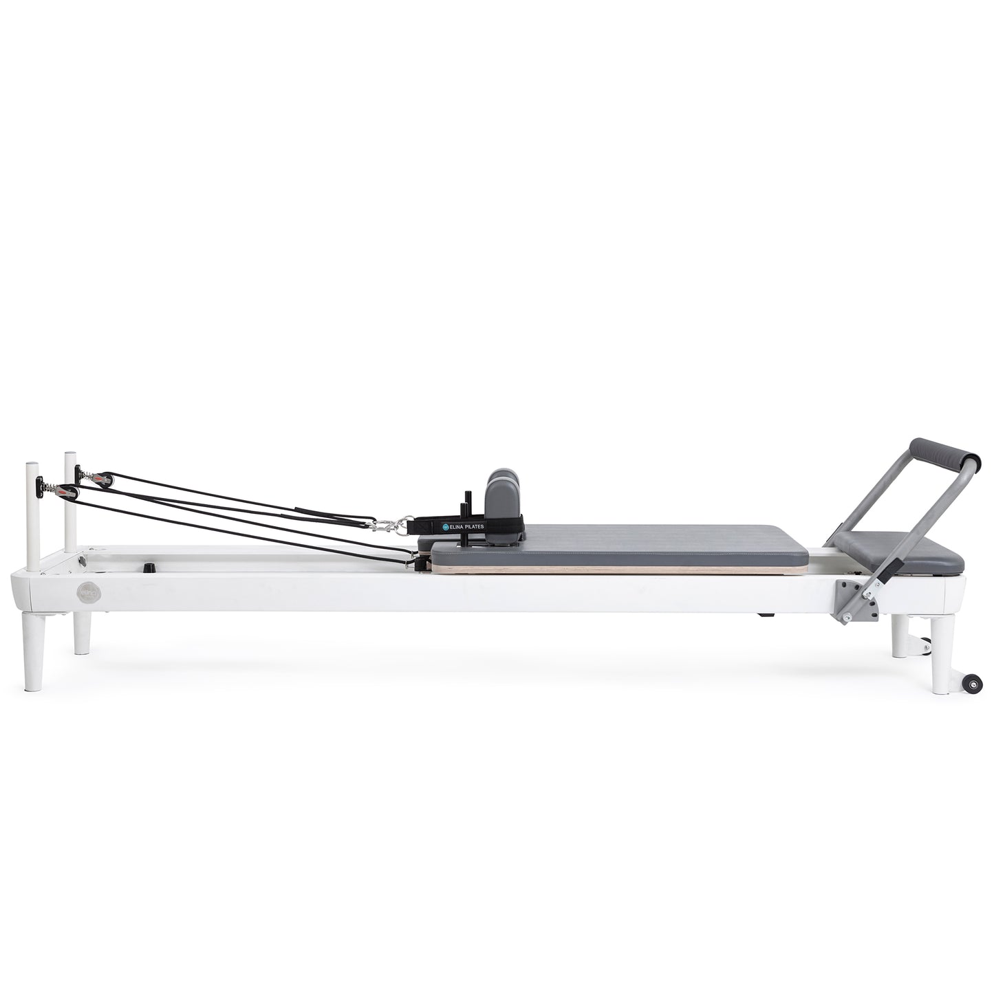 Side profile view of the Elina Pilates Nubium Reformer showcasing the sleek aluminum frame and grey upholstery
