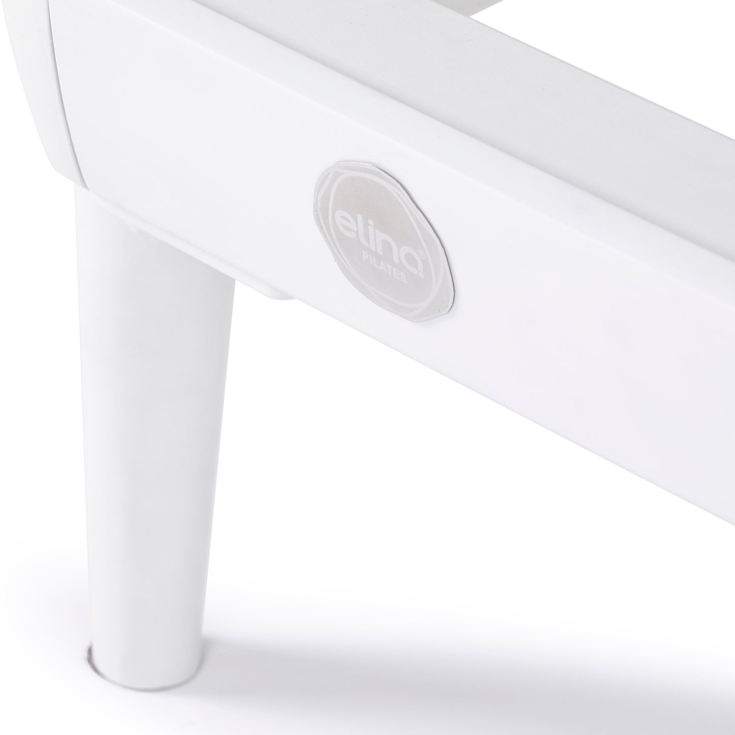 Side profile view of the Elina Pilates Nubium Reformer showcasing the sleek aluminum frame