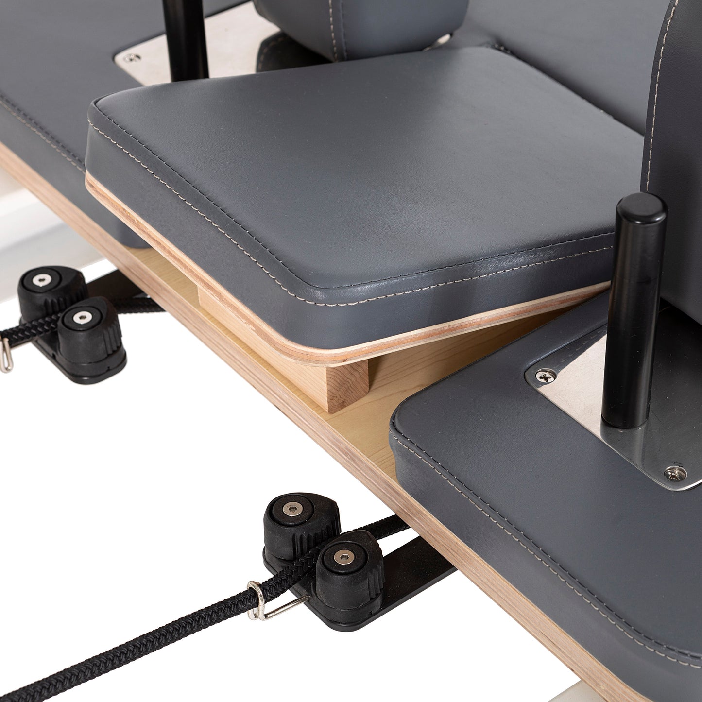 Detail of the pulley posts and rope system on the Elina Pilates Nubium Reformer for customizable resistance
