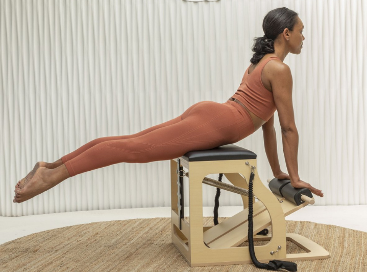 Woman working out with Elina Pilates Alma Chair