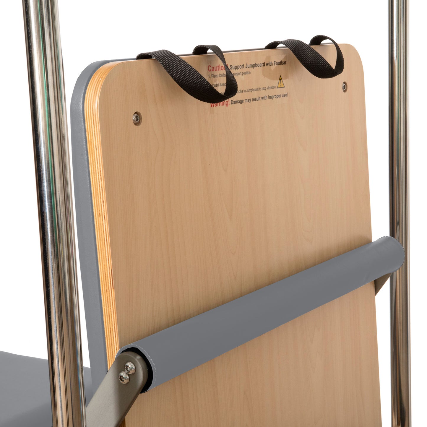 Close-up of padded carriage and headrest on the Elina Pilates Cadillac Reformer