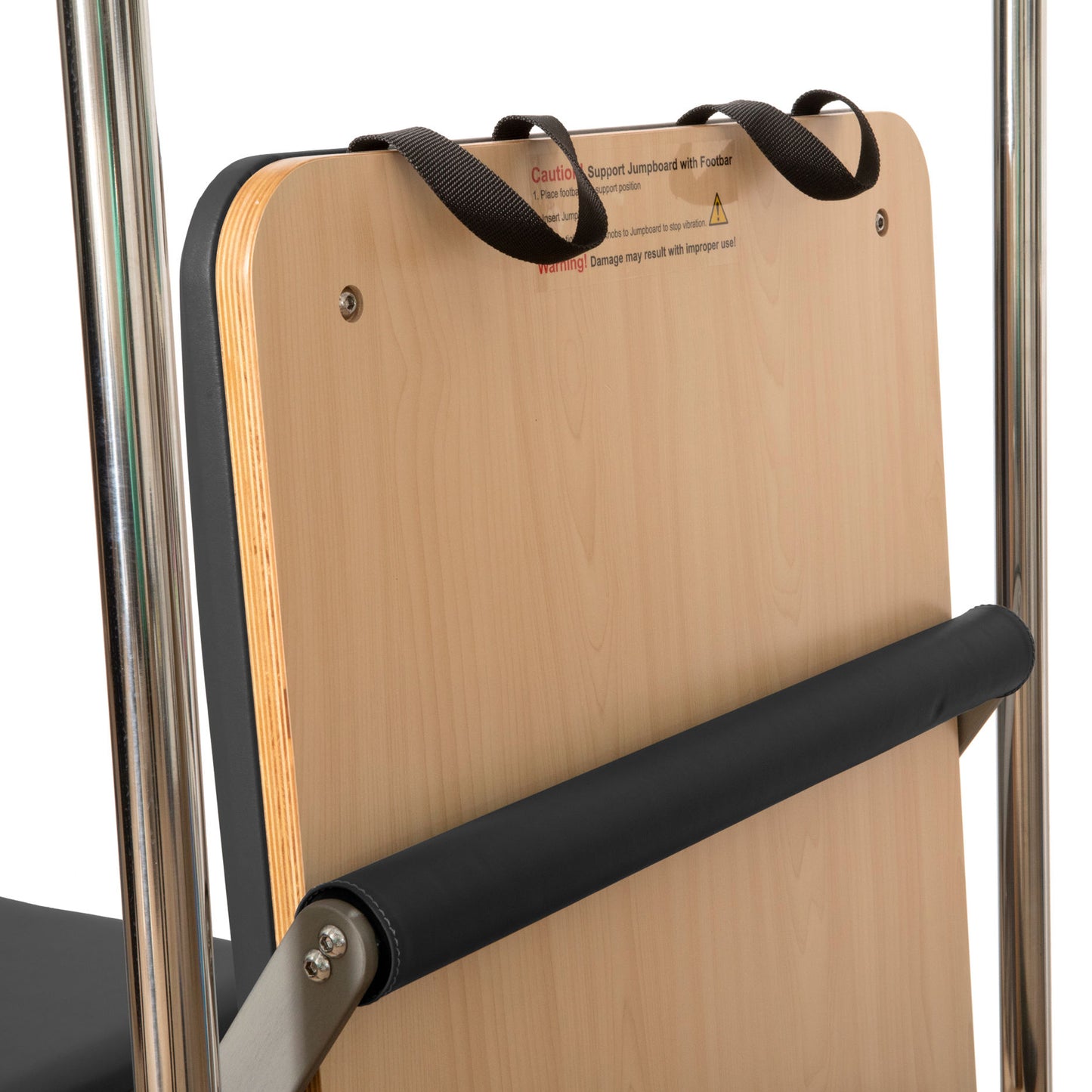 Close-up of padded carriage and headrest on the Elina Pilates Cadillac Reformer