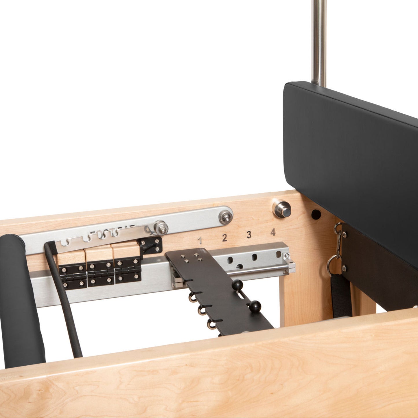 Adjustable push-through bar and springs attached to the Cadillac tower