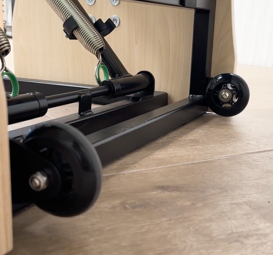 Close-up of easy transport wheels on Elina Pilates Combo Chair