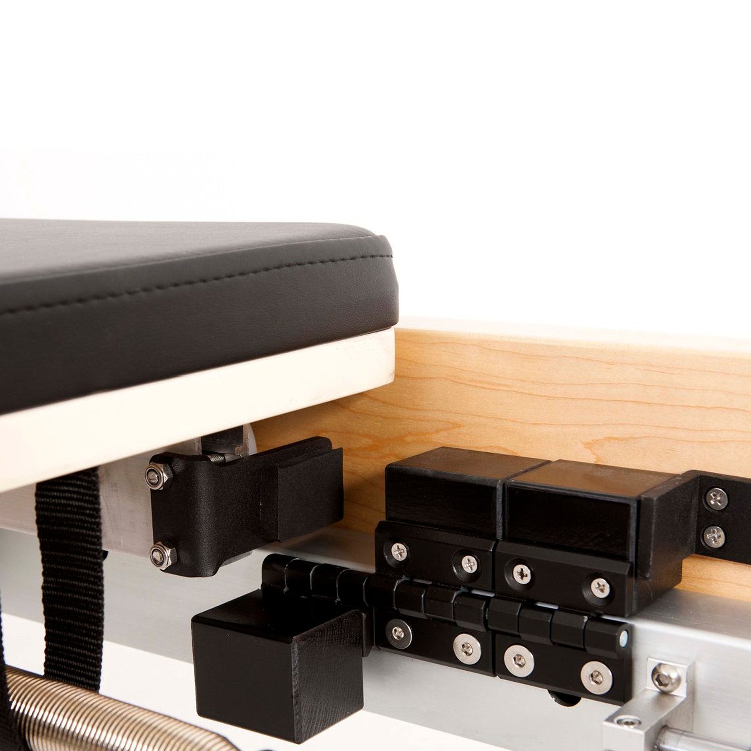 Closeup of Elina Pilates Wooden Half-Trapeze Tower Reformer carriage system