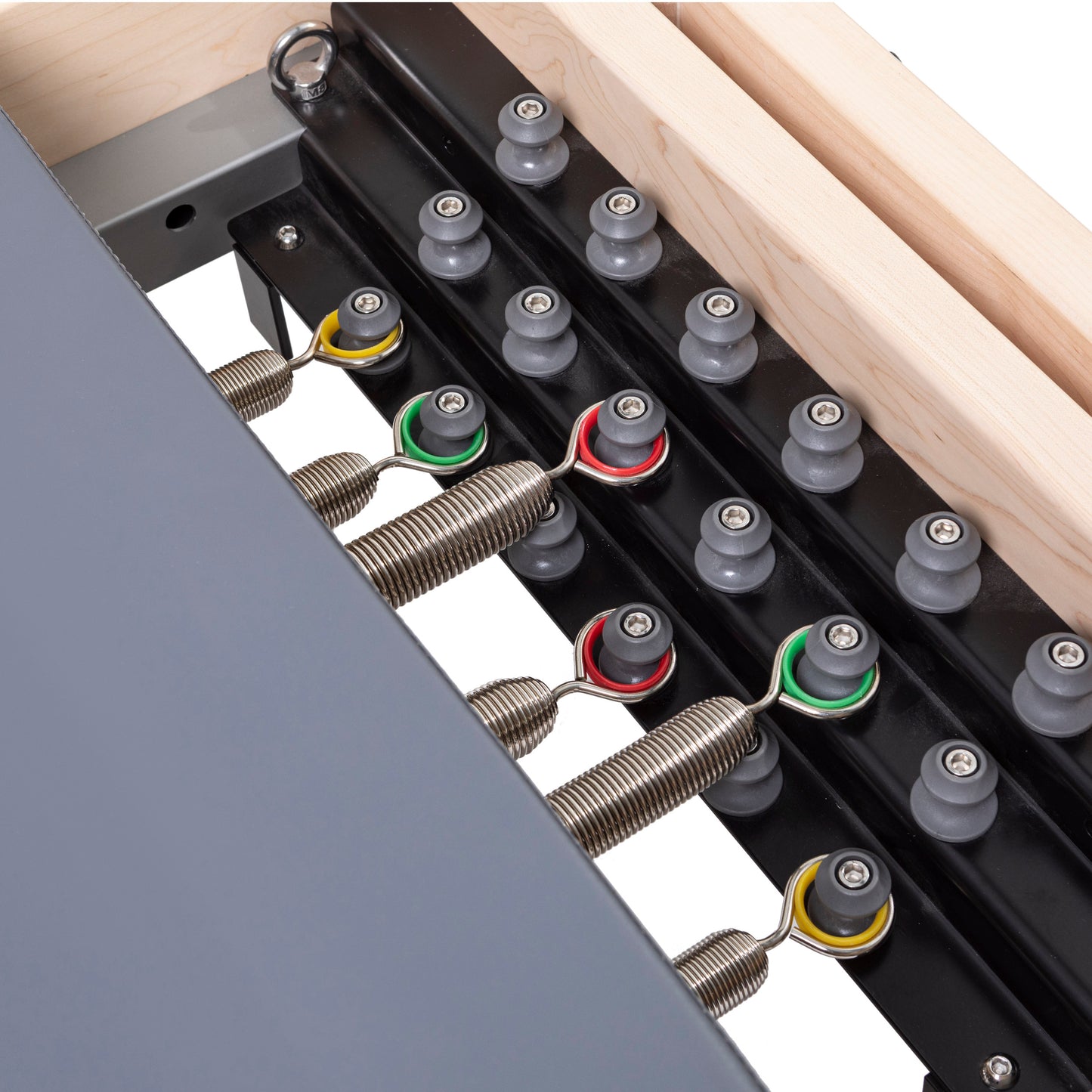 Close-up of durable resistance springs on the Elina Pilates Master Instructor™ Reformer showing tension and adjustment mechanisms