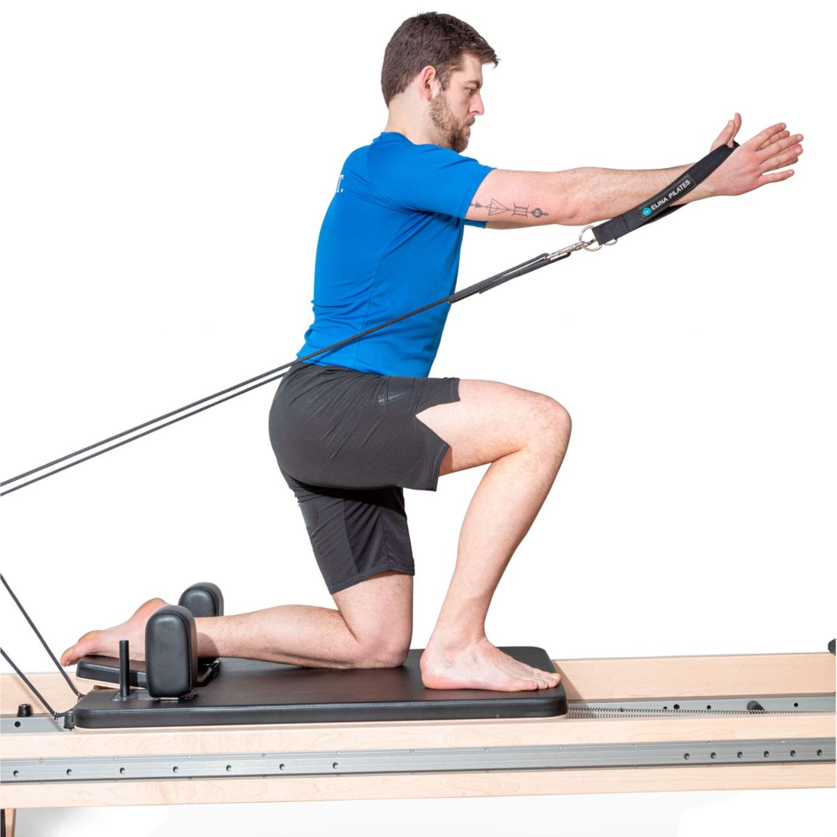 Pilates practitioner performing exercises on the Elina Pilates Physio Reformer Master Instructor with Mini-Tower in a studio setting