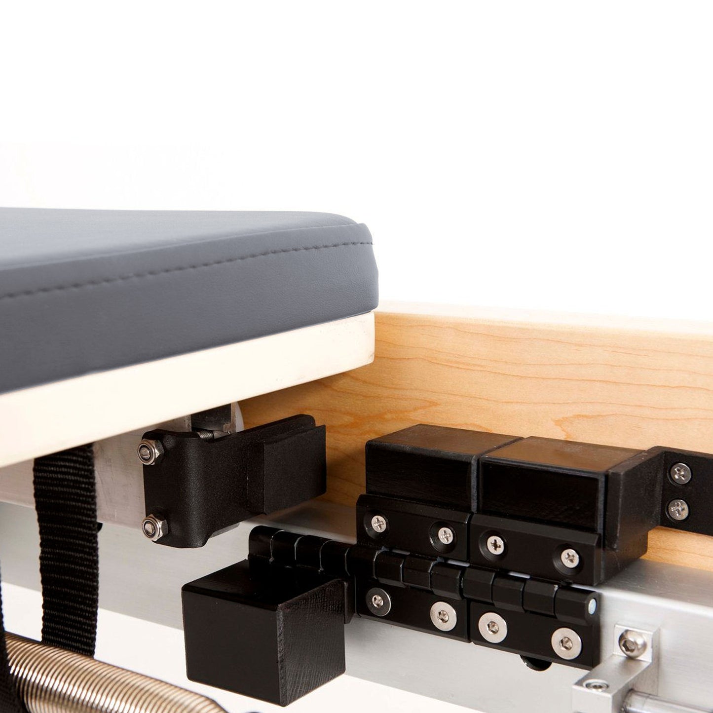 Closeup of Elina Pilates Wood Reformer carriage system