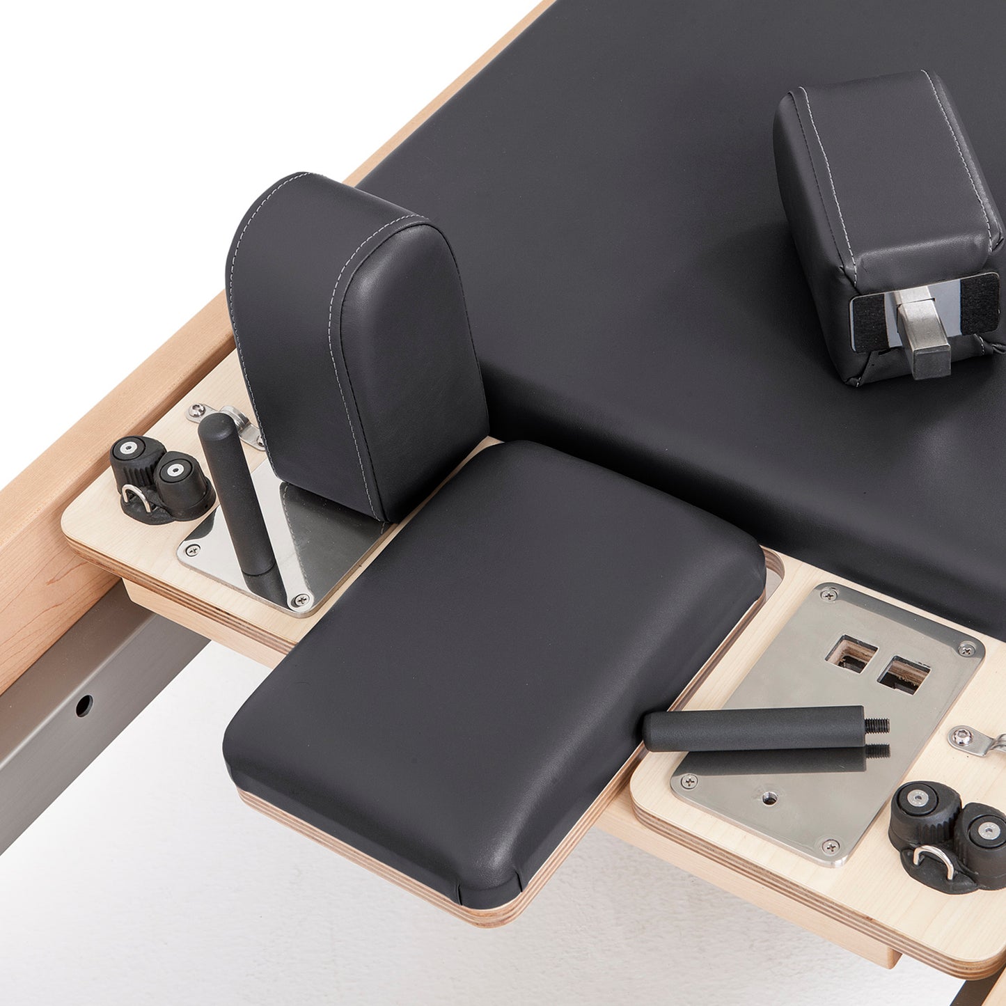 Ergonomic shoulder rests on Elina Pilates Wood Reformer with Tower Pro for comfort and stability during exercises.