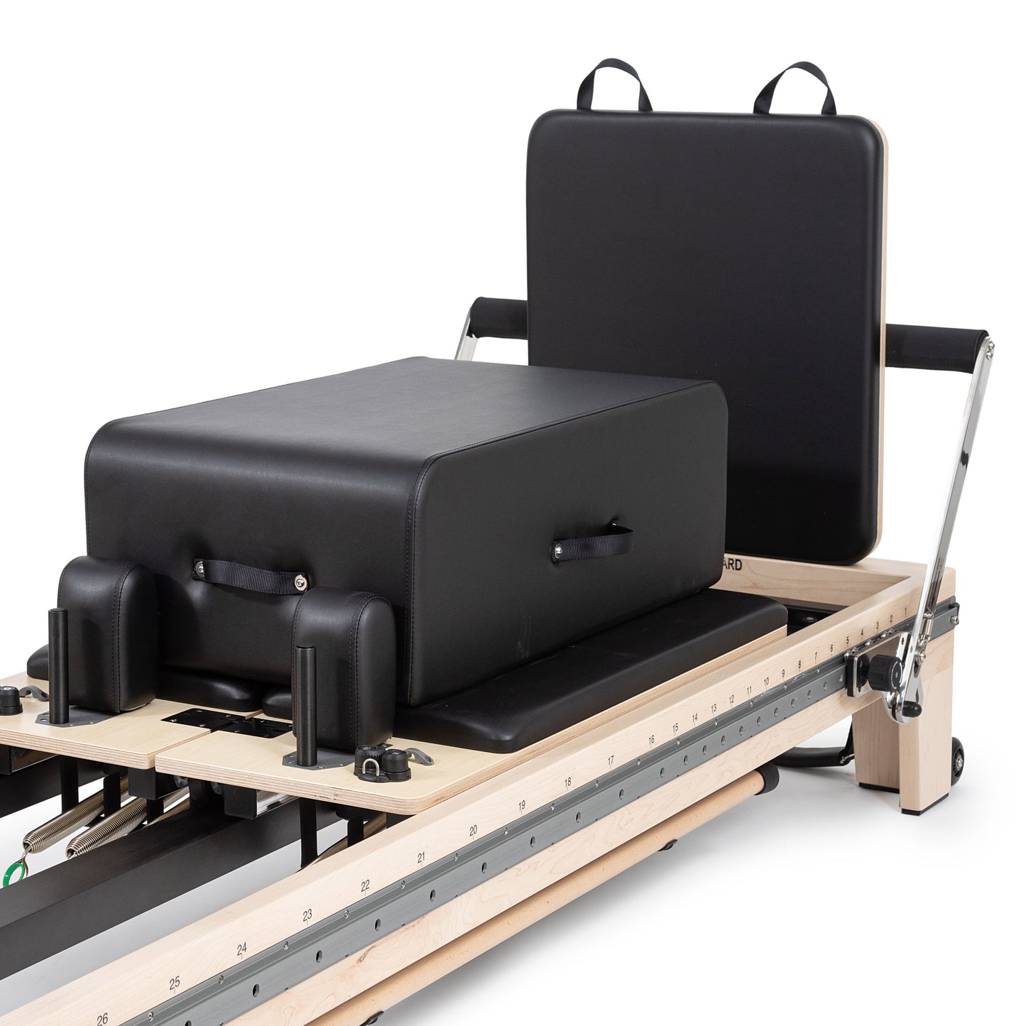 Close-up of the padded box on Elina Reformer with precision wheels and glide rails