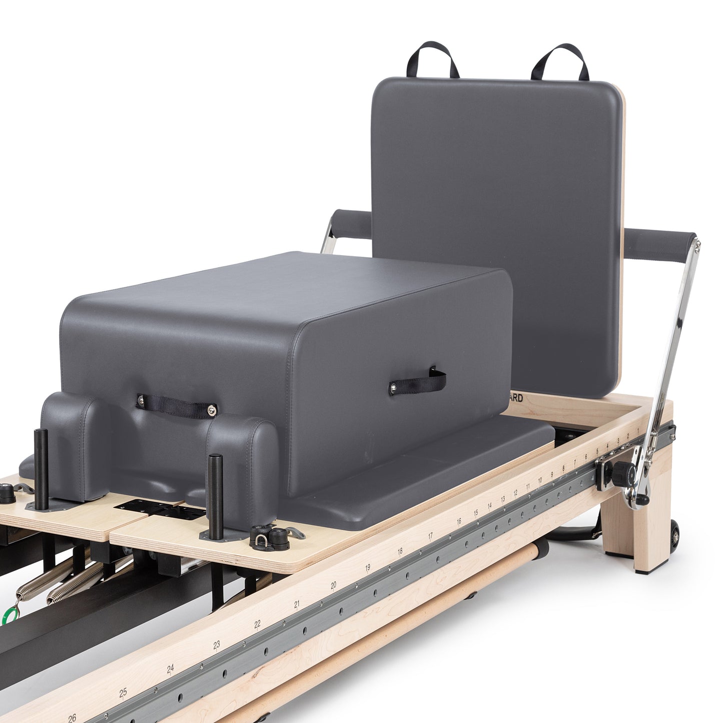 Close-up of the padded box on Elina Reformer with precision wheels and glide rails