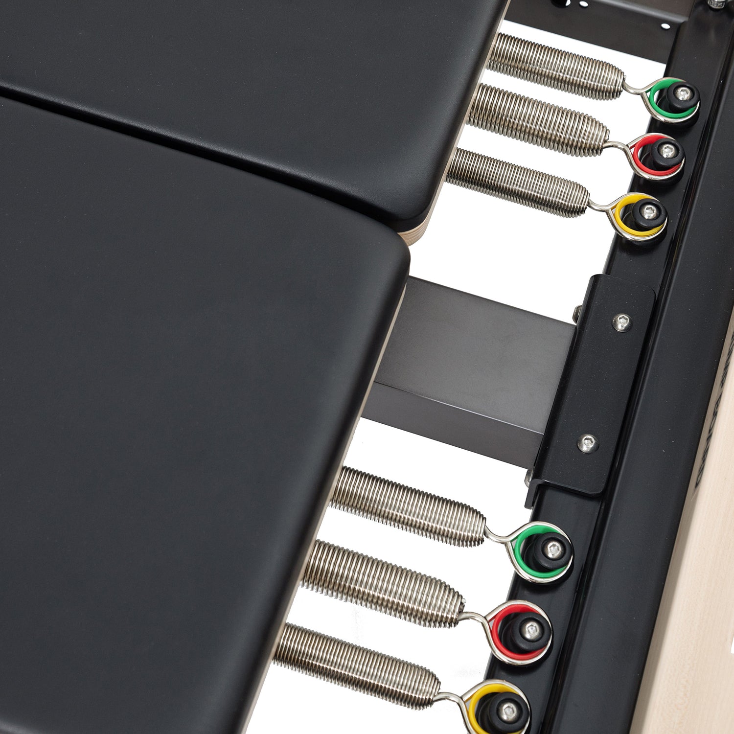Close-up of the adjustable resistance springs on Elina Twin Reformer