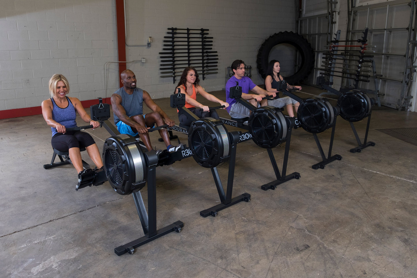 Users working out with the Endurance R300 Indoor Rower for full-body cardio workout