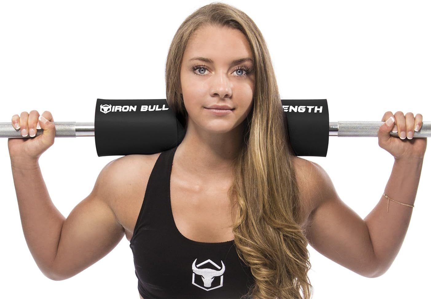 Iron Bull Strength squat pad placed on Olympic barbell for neck and shoulder protection