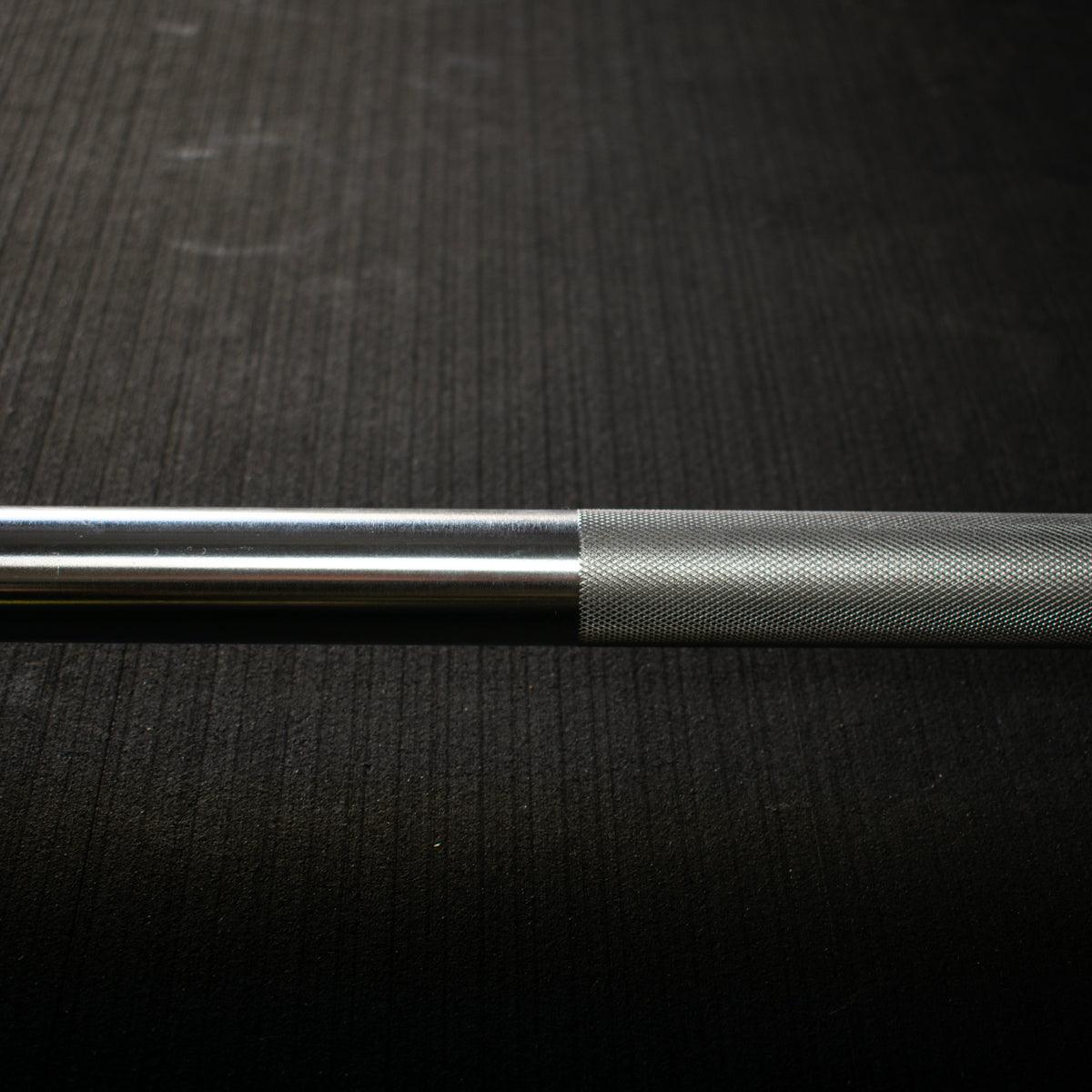Close-up of precision knurling on Olympic bar