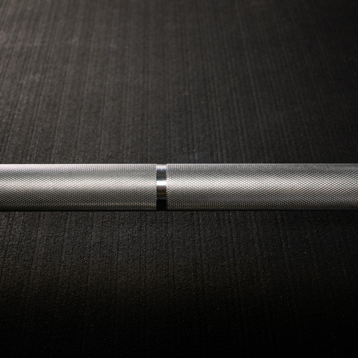 Close-up of precision knurling on Olympic bar