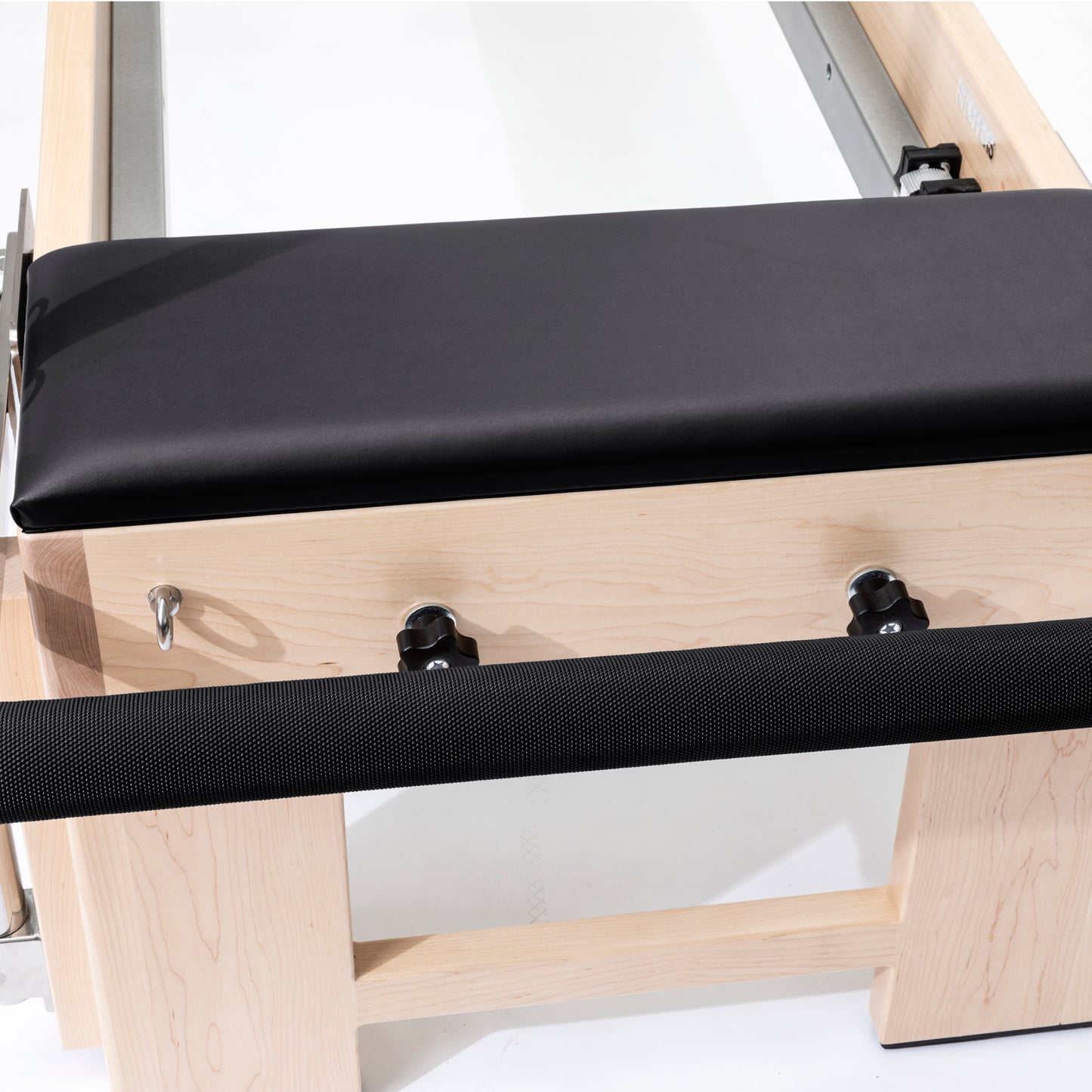 Professional Pilates Cadillac Reformer Elite with solid wood frame and black padding