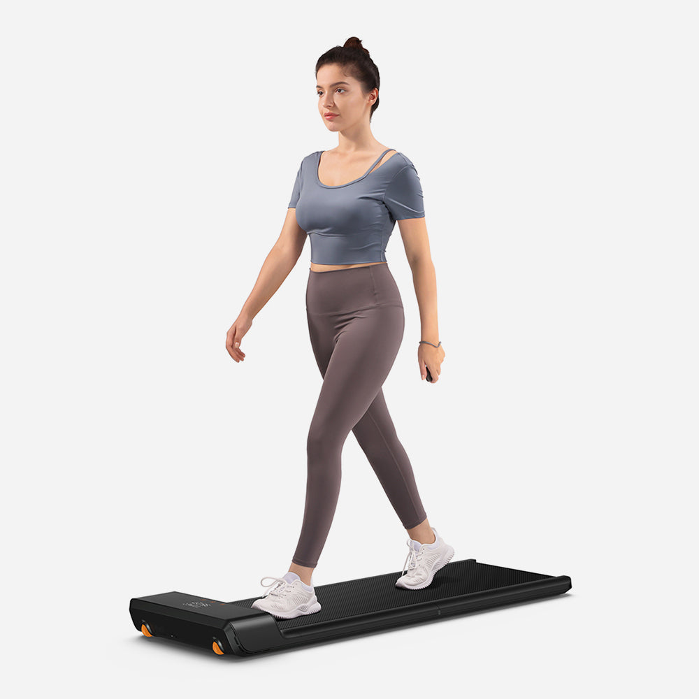 User walking on the WalkingPad A1 Pro Treadmill