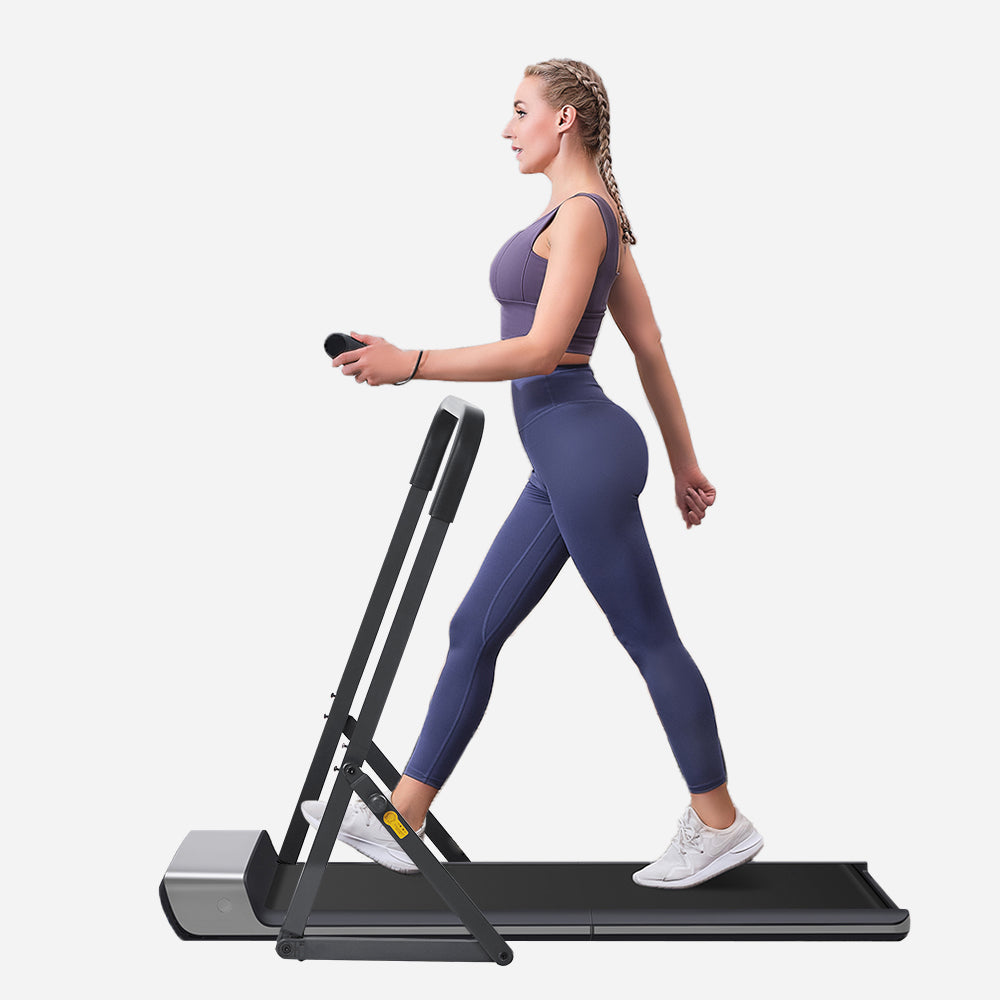 Woman walking on the WalkingPad P1 treadmill