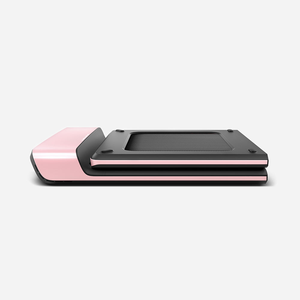 Side view of folded WalkingPad P1 Pink Foldable Treadmill