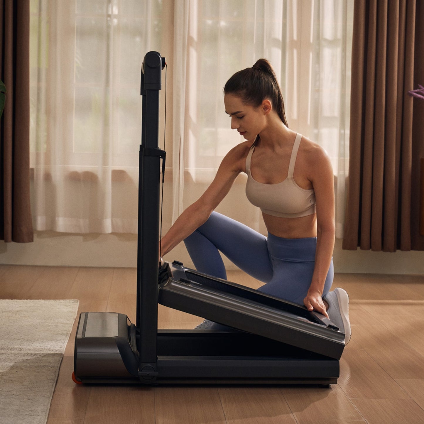 View of WalkingPad R3 Hybrid Foldable Treadmill easily folding for storage