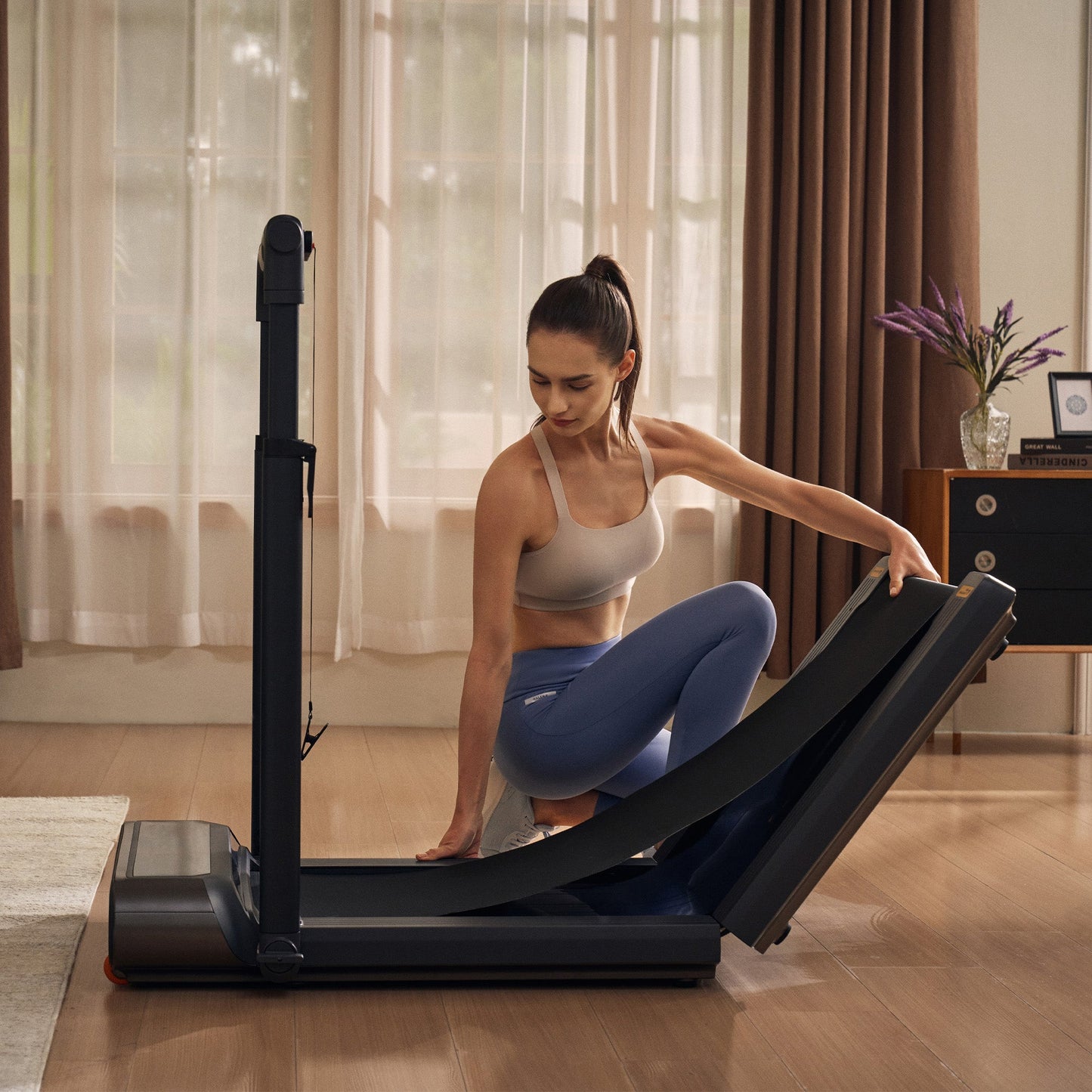 View of WalkingPad R3 Hybrid Foldable Treadmill easily folding for storage