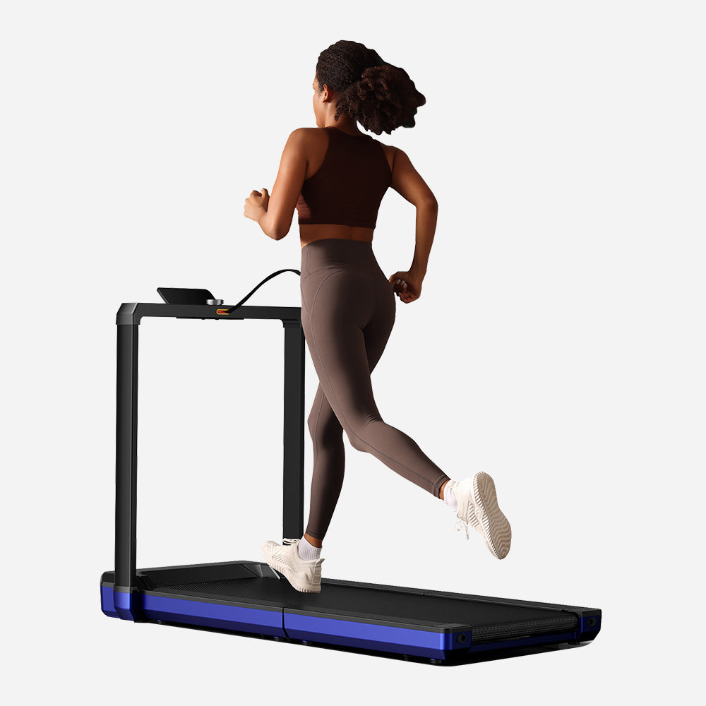 Woman running on Blue WalkingPad X25 Foldable Treadmill