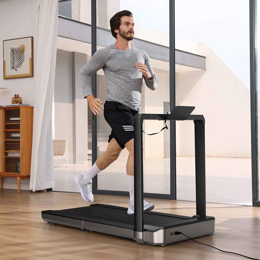 Person running on the WalkingPad X25 Foldable Treadmill in home
