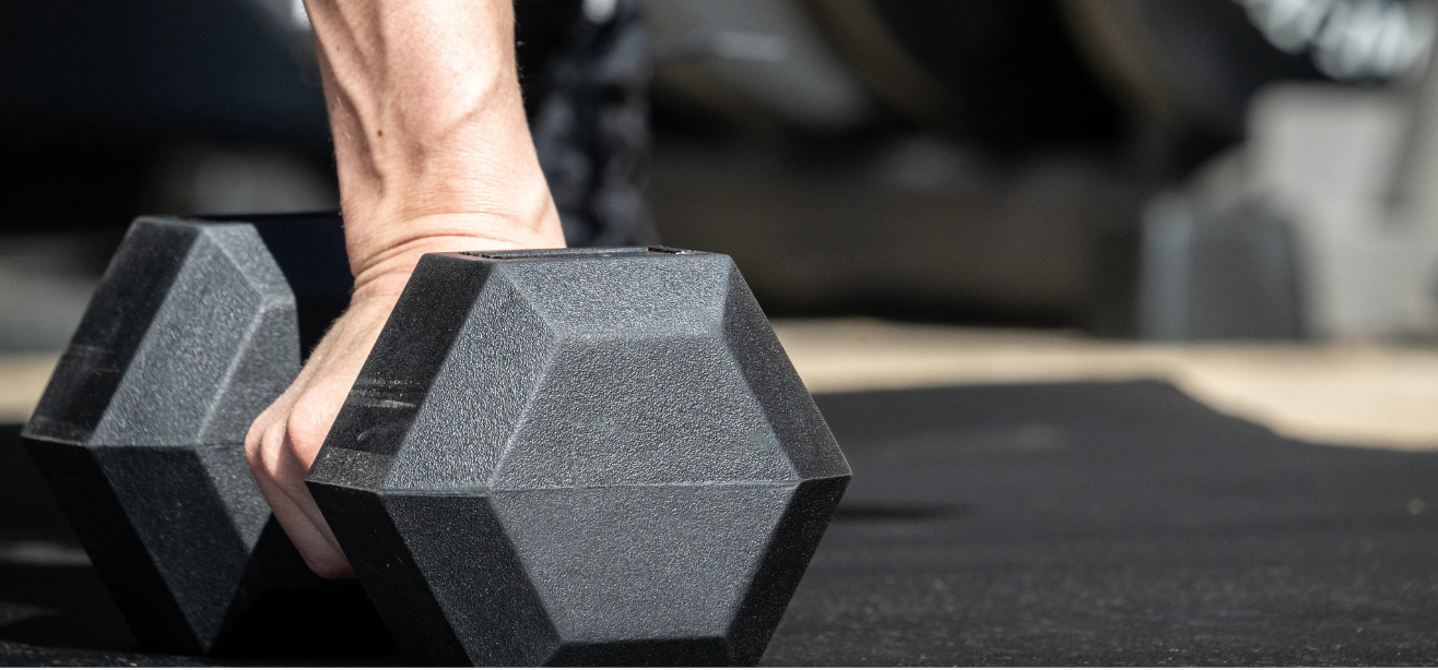 XMark 550 lb rubber hex dumbbell set with 10 pairs from 10-50 lbs